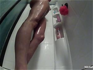 Nikita takes a jaw-dropping shower